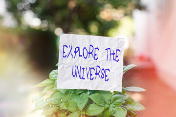 Conceptual hand writing showing Explore The Universe. Concept meaning Space and Scientific...
