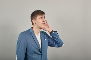 Eavesdropping, espionage, gossip, holding hand near head and looking away, what, relying on...