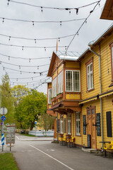 Pärnu (Parnu) / Estonia - May 14 2020: Large old wooden yellow building in historical center of Parnu, 