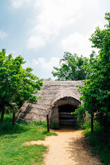 Straw hut traditional house at Ganghwa Dolmen park UNESCO World Heritage Site in Incheon, Korea