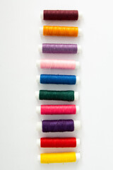 collage of threads for sewing different colors