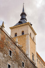 Fototapeta na wymiar Tower of the Alcazar of Toledo, a stone fortification located in the highest part of Toledo, Spain.