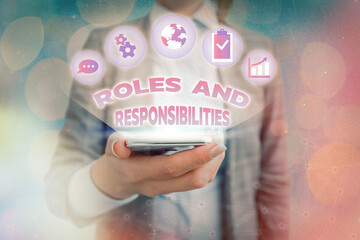 Text sign showing Roles And Responsibilities. Business photo showcasing Business functions and...