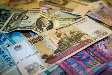 Closeup shot of different currencies. Good for presentations in finance, accounting or business development 
