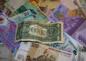 Closeup shot of different currencies. Good for presentations in finance, accounting or business development 