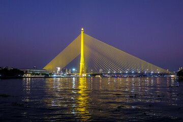Night picture of Rama VIII bridge over Chao Praya river, Bangkok, Thailand
