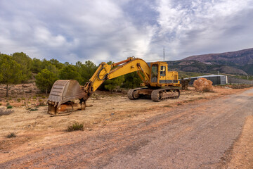 Obraz premium earthmoving machine on a road works