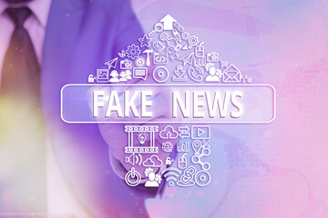 Handwriting text writing Fake News. Conceptual photo false information publish under the guise of...