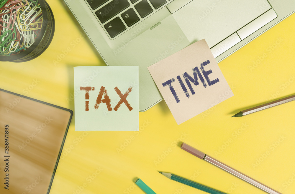 Poster writing note showing tax time. business concept for notification of the need to file tax returns wit