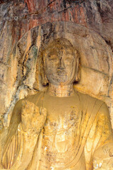It's Buddha statue at the Longmen Grottoes ( Dragon's Gate Grottoes) or Longmen Caves.UNESCO World...