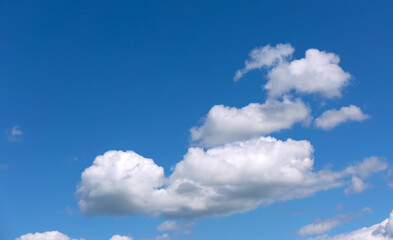 Obraz na płótnie Canvas White clouds on blue sky background.