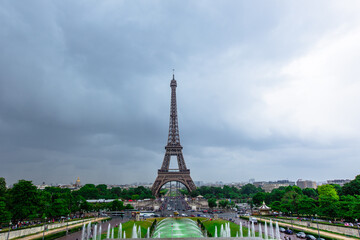 The eiffel tower on a cloudy day, in Paris, France.