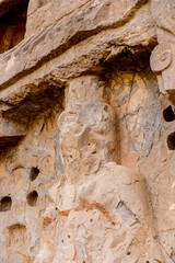 It's Longmen Grottoes ( Dragon's Gate Grottoes) or Longmen Caves.UNESCO World Heritage of tens of thousands of statues of Buddha and his disciples