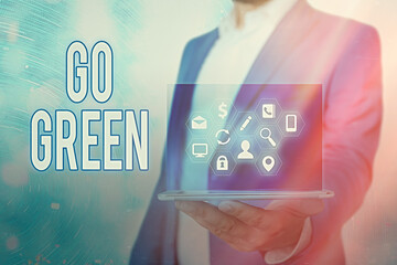 Handwriting text Go Green. Conceptual photo pursue a more environmentfriendly lifestyle and decision