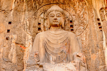 It's Biggest Buddha statue at the Longmen Grottoes ( Dragon's Gate Grottoes) or Longmen Caves.UNESCO World Heritage of tens of thousands of statues of Buddha and his disciples