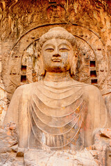 It's Biggest Buddha statue at the Longmen Grottoes ( Dragon's Gate Grottoes) or Longmen Caves.UNESCO World Heritage of tens of thousands of statues of Buddha and his disciples