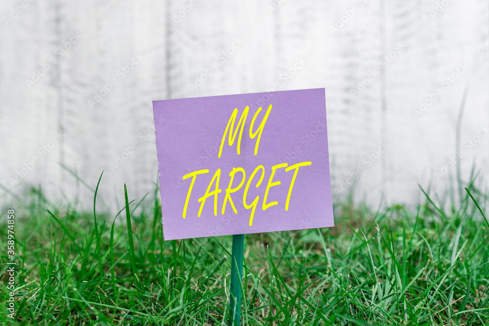 Poster writing note showing my target. business concept for aiming for the goals desperately to achieve it 