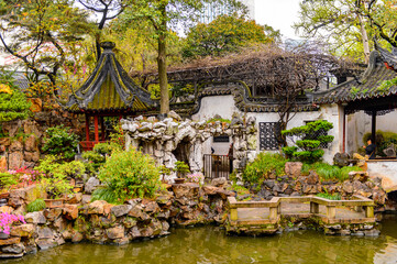 Fototapeta na wymiar It's Yu or Yuyuan Garden (Garden of Happiness), an extensive Chinese garden located Old City of Shanghai, China