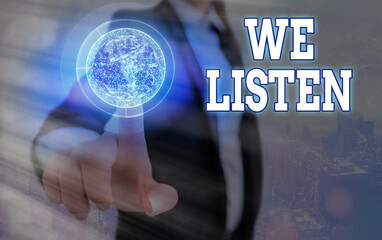 Text sign showing We Listen. Business photo text an organization willing to pay attention by...