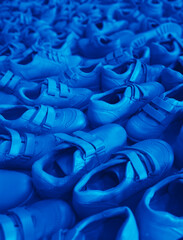 Obraz premium Blue shoes at the store background