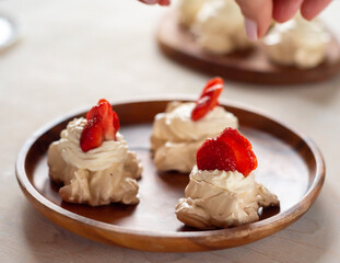 Pavlova dessert, the meringue with strawberries