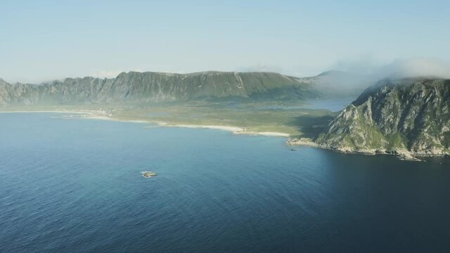 Aerial view ocean and beach coast with mountains rocks in Norway drone landscape beautiful travel destinations Vesteralen islands