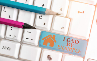 Word writing text Lead By Example. Business photo showcasing Be a role model by following the rules...