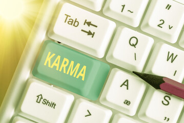 Writing note showing Karma. Business concept for sum of an individual actions in this and previous...