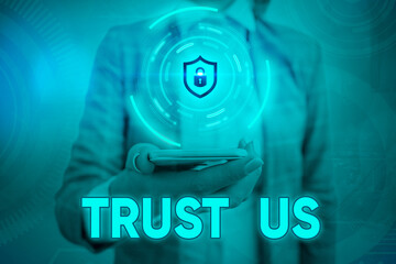 Text sign showing Trust Us. Business photo showcasing believing in the integrity and honesty of a...