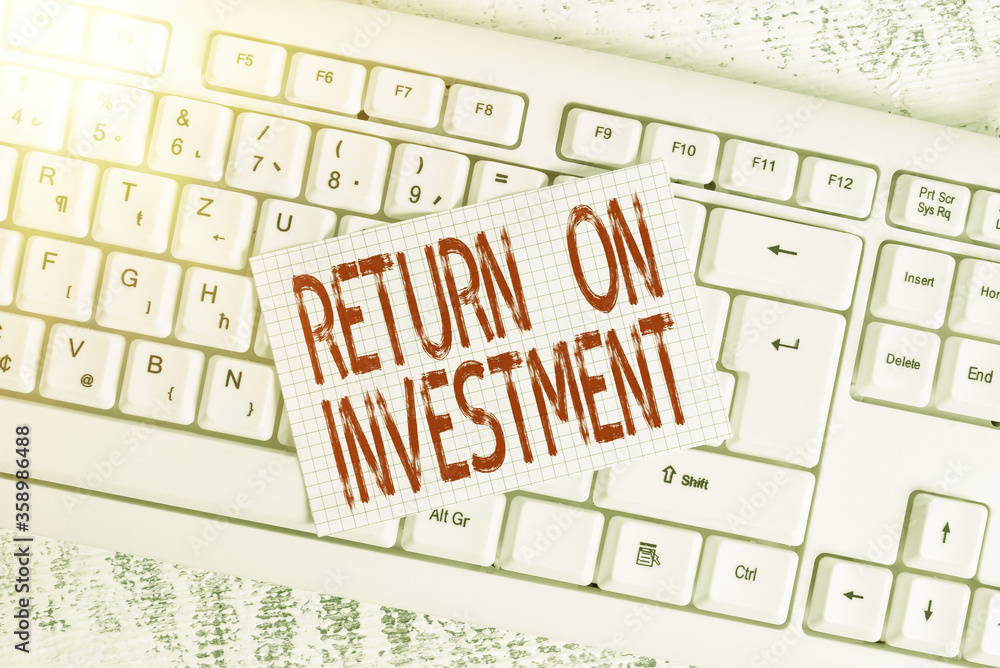 Aufkleber writing note showing return on investment. business concept for reviewing a financial report or inve