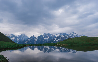 Naklejka na ściany i meble Mountain lakes of Koruldi. Caucasian mountains. Cold mountain water.