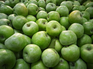 Lots of green apples. Close up
