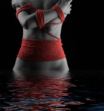 Young woman with shibari