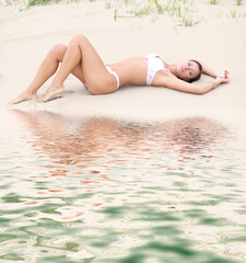 Obraz premium young girl sits sexy lingerie