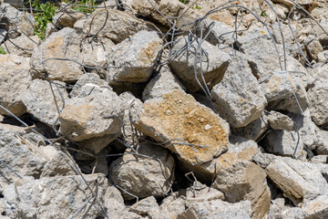 Pile of rubble from a dismantled building at a demolition site.