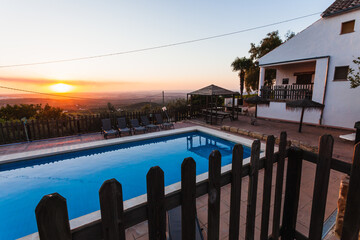 Exterior terrace of a rural rental house with pool in Spain.