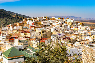 Fototapeta na wymiar It's Spectacular aerial view of Moulay Idriss, the holy town in Morocco, named after Moulay Idriss I arrived in 789 bringing the religion of Islam