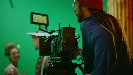 Portrait of Cameraman on Railway Trolley Shooting Green Screen Scene