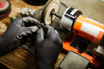 close-up. The jeweler makes a silver ring. On the island of Bali. Indonesia