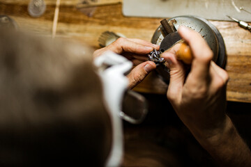 close-up. The jeweler makes a silver ring. On the island of Bali. Indonesia