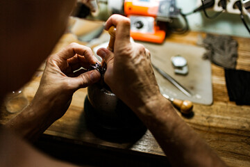 close-up. The jeweler makes a silver ring. On the island of Bali. Indonesia