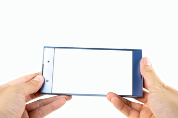 Person holding smartphone in a hand, phone in a woman's hand