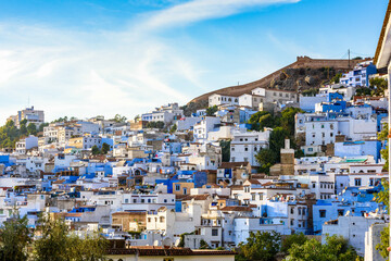 It's Panorama of Chefchaouen, Morocco. Town famous by the blue painted walls of the houses - obrazy, fototapety, plakaty