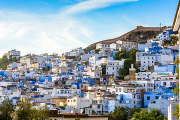 Papier Peint photo Lavable Maroc It's Panorama of Chefchaouen, Morocco. Town famous by the blue painted walls of the houses
