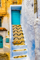 It's Blue walls of the houses of Chefchaouen, Morocco.