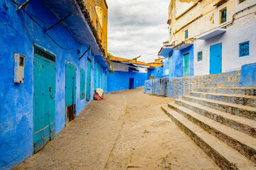 Fototapeta na wymiar It's Blue walls of the houses of Chefchaouen, Morocco.