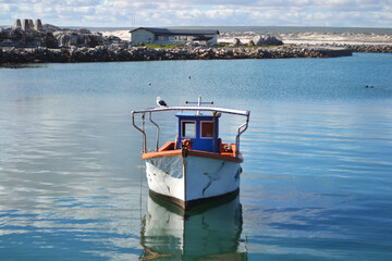 Small fisherman boat in harbour 