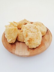 Fried fermented cassava, Indonesian famous street food or street snack. Indonesian called tape goreng, rondo royal or fried peuyeum. Sweet, creamy, crunchy outside, little oily and delicious.
