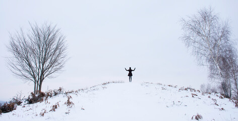 man playing with snow