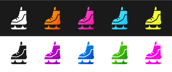 Set Skates icon isolated on black and white background. Ice skate shoes icon. Sport boots with blades. Vector Illustration.
